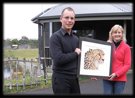 Donation of Wildlife print of cheetah artwork by Karen Neal donated to Orana Wiildlife Park